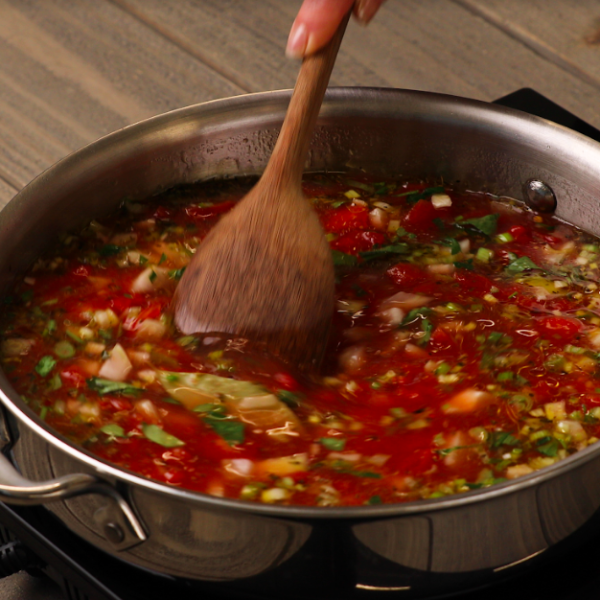 a pan of food on a stove